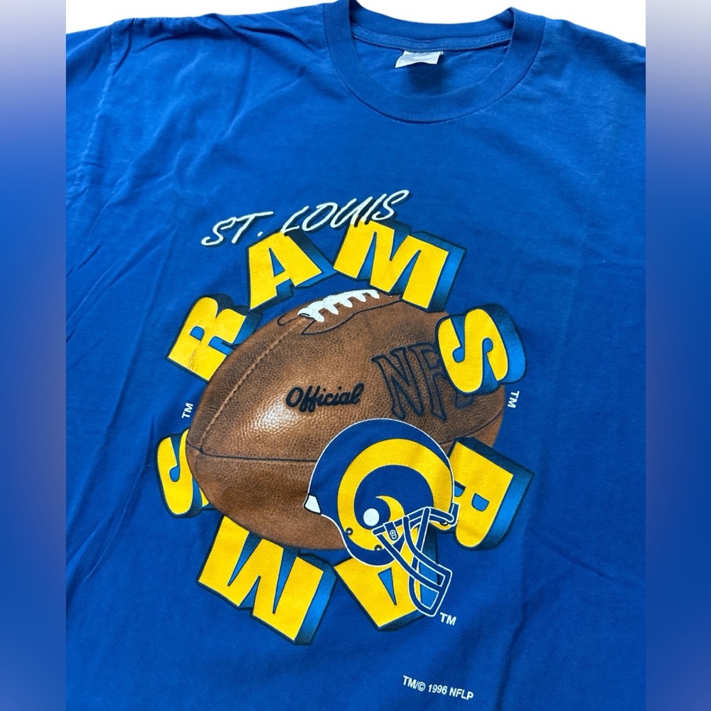 Vintage 1996 Advance Athletic Men’s Size XL St Louis Rams T Shirt Blue & Gold‎